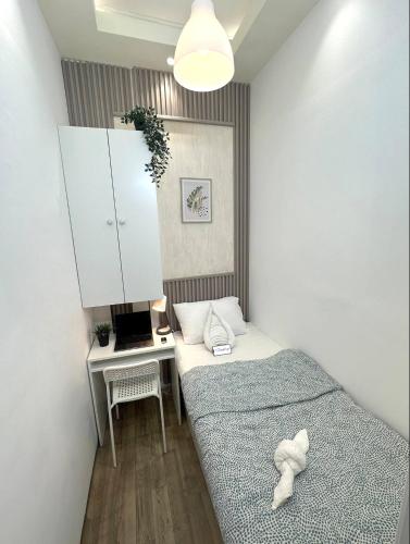 Cozy Partition Room for Travelers in Tecom, Dubaj (fotografie 7)
