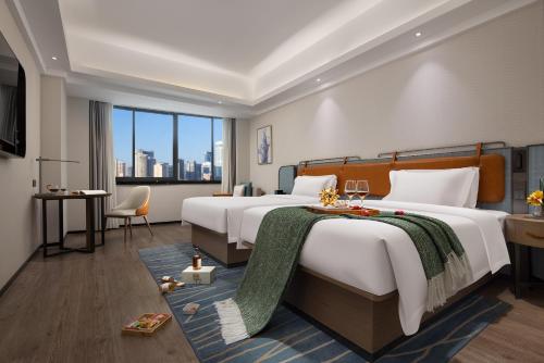 Anya Hotel -Next to Jiefang West Bar Street 2 minutes to the subway station free coffee free laundry free gym, huge windows Anya Hotel -Next to Jiefang West Bar Street 2 minutes to the subway station free coffee free laundry free gym, huge windows