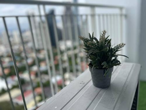 Cozy Makati Condo Getaway with balcony - Tap to explore photos
