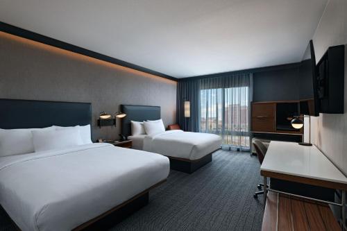 Queen Room with Two Queen Beds room in Courtyard by Marriott Colorado Springs North Air Force Academy