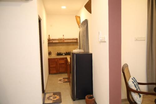 Kitchen, Earth Homestay in Boralesgamuwa