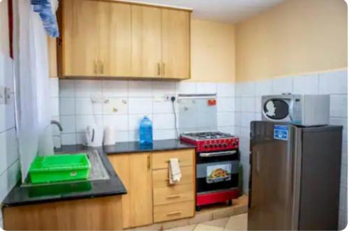 keuken, Lux Suites Makao Rossyln Apartments in Ruaka