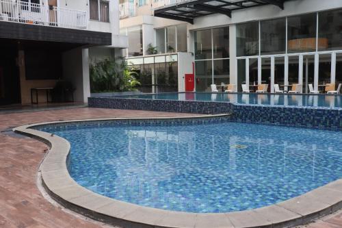 Piscine, Studio de 27&nbsp;m² en Appartement avec 1&nbsp;salle(s) de bains privée(s) à Tanah Sereal (Dejati Condotel Studio - Bogor Icon) in Tanah Sereal