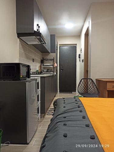 Kitchen, Bela Getaway Homes Deluxe Studio Apartment in Athi River