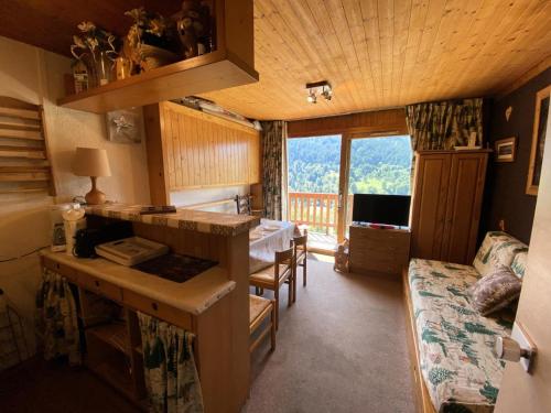 Residence Le Genevrier - Studio pour 4 personnes en plein centre de Meribel dans une residence calme in Lezeretta
