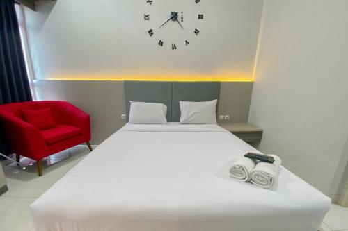 Comfortable 1BR without Living Room at Amartha View Apartment By Travelio