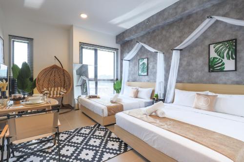 모사즈 스위트 바이 마이키 글로벌 (Mossaz Suites by Mykey Global) in 원 우타마 / 다만사라