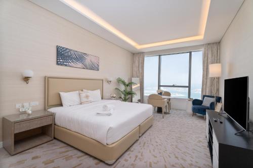Nasma Luxury Stays - Sea-View Studio in Palm Tower with Full Amenities, Dubaï