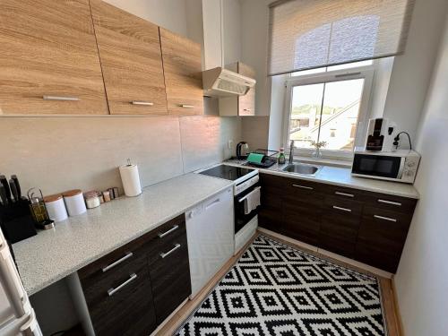 Słoneczny apartament blisko jeziora i gór