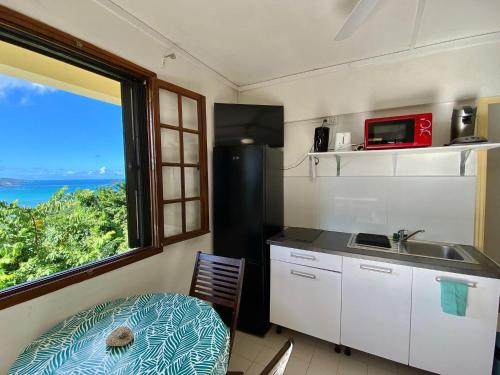 Top Hill Appartements - Location saisonnière - La Trinité