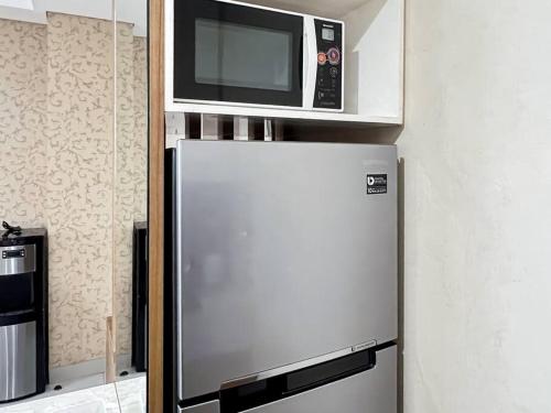 Cozy 2BR Apt Trivium w/ Pool, Gym, WiFi by 2ndHome near Hop Hop the Bubble Drinks