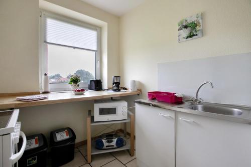 ห้องครัว, Ferienwohnung Postel in เมลดอร์ฟ