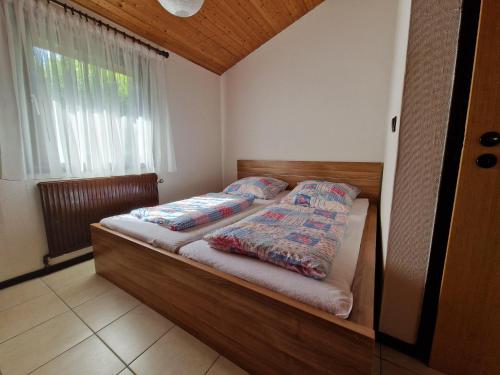 Single storey detached bungalow in a wooded area - image 2