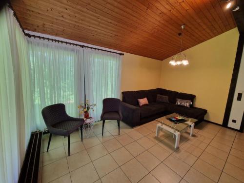 Single storey detached bungalow in a wooded area - image 10
