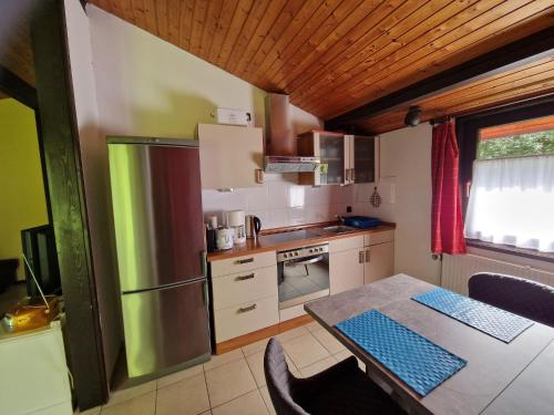 Single storey detached bungalow in a wooded area - image 8