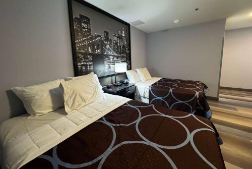 Double Room with Two Double Beds and Roll-in Shower - Mobility Access/Non-Smoking