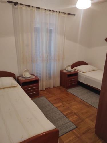 Apartments Tenara - close to sea - image 5