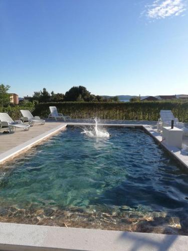 Apartments Pool - pool and grill - image 11
