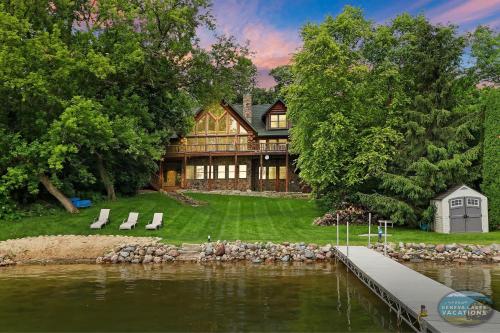 Waterfront Hand-Crafted Log Cabin - Sandy Beach - Dock - 5200 Sq Ft - Stone Fireplace - Views in Whitewater, USA