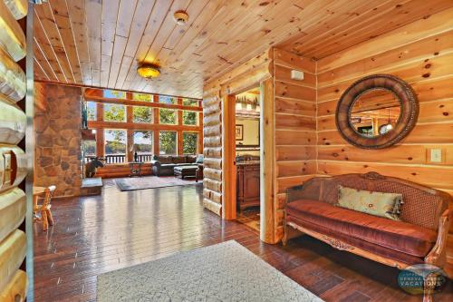 Waterfront Hand-Crafted Log Cabin - Sandy Beach - Dock - 5200 Sq Ft - Stone Fireplace - Views in Whitewater, USA