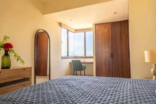 HIDDEN PARK - 7th Floor Apt with Rooftop Pool at Versalles in Puerto Vallarta, Mexico
