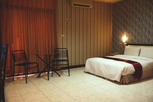 Jiuning Business Hotel