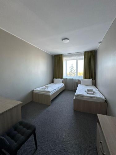 Гостиница Kokshe Inn in Kokshetau