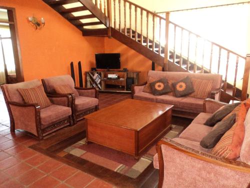 ห้องส่วนกลางสำหรับนั่งเล่น/ดูทีวี, Sangare Gardens in เนย์รี