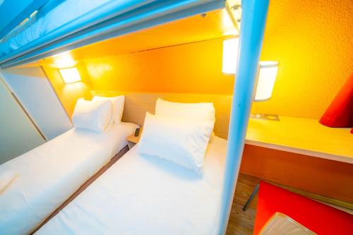 Chambre triple, 3 lits
