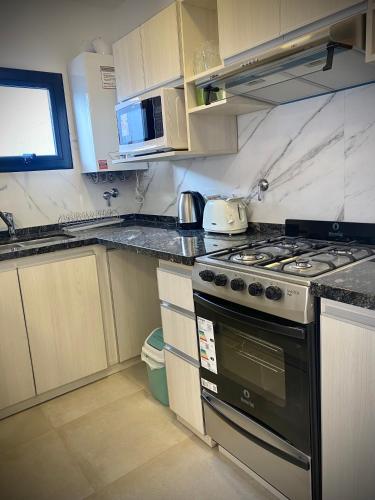 廚房, Departamento TERRANOVA un refugio tranquilo en el corazón de La Falda (Departamento TERRANOVA un refugio tranquilo en el corazon de La Falda) in 拉法爾達