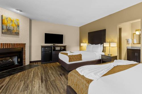 Queen Room with Two Queen Beds and Fireplace