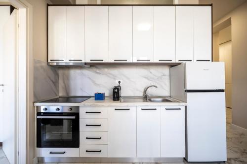 Maragliano Prestige Apartments - A Due Passi dalla Tramvia - Tap to explore photos