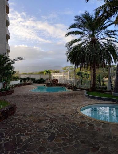 Swimming pool, Elegante Apartamento en Costa Azul, con Agua 24H in Pampatar