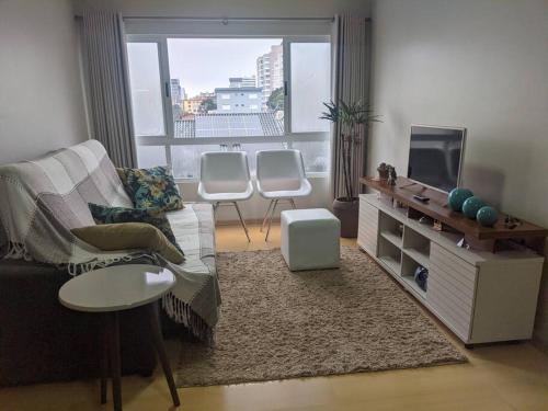. Apartamento aconchegante no centro e com garagem