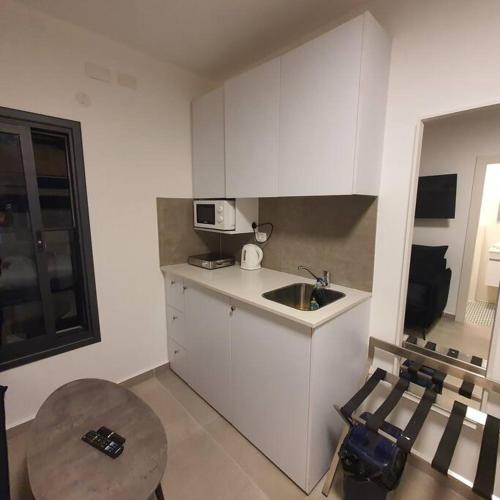 Ryo 22 דירה במלון בוטיק 2 דקות מטיילת בת ים in 貝特雁