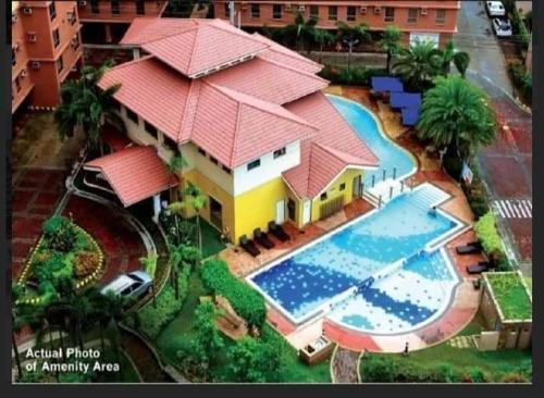 Cozy Studio Unit near Manila Airport With Swimming Pool, Full Kitchen 7A, Manila