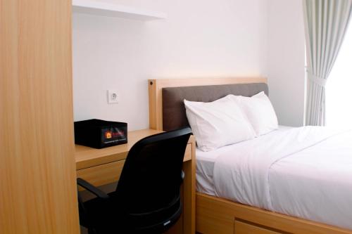 Comfort 1BR at Vasanta Innopark Apartment By Travelio, Cikarang