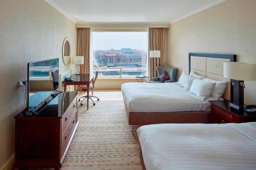 Chambre avec 2 lits, deluxe, vue sur l’eau