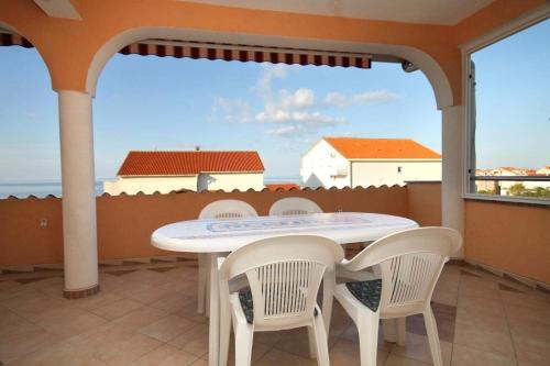 Terraza/balcón, Apartment and Room Cherry in Novalja