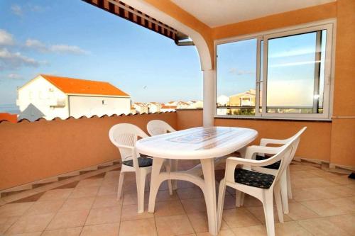 Terraza/balcón, Apartment and Room Cherry in Novalja