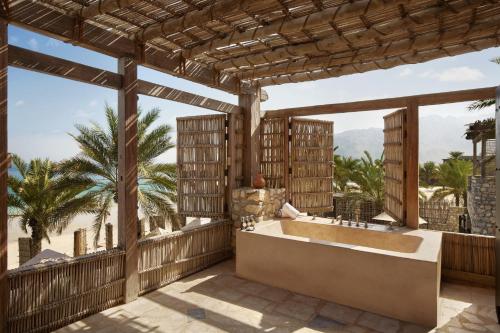 Open air bath, Six Senses Zighy Bay in Zighy Bay