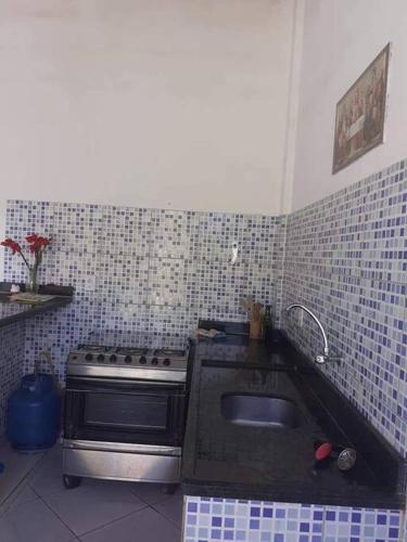 ห้องครัว, Casa de veraneio 150 m da praia in คานาเวียอิรัส