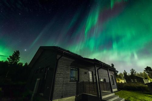Villa Polar Lights with Jacuzzi by Book Lapland – khách sạn tại Vennivaara
