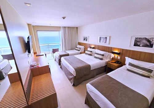 Chambre quadruple, deluxe, bord de plage, face à l’océan