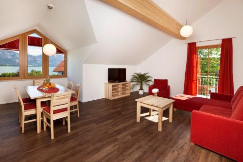 Közös társalgó / TV, Seehotel und Appartements Schnoller in Rieden am Forggensee