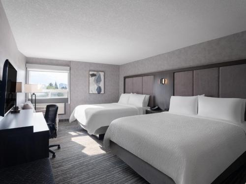 Standard Queen Room with Two Queen Beds image 1
