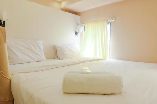 Strategic 2BR Gateway Ahmad Yani Cicadas Apartment By Travelio, Bandung