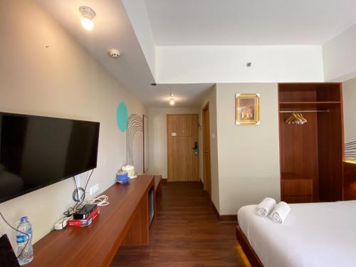 Homey Studio No Kitchen at Gateway Park LRT City Bekasi Apartment By Travelio Homey Studio No Kitchen at Gateway Park LRT City Bekasi Apartment By Travelio