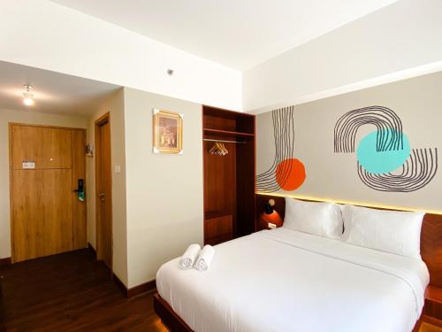 Homey Studio No Kitchen at Gateway Park LRT City Bekasi Apartment By Travelio Homey Studio No Kitchen at Gateway Park LRT City Bekasi Apartment By Travelio