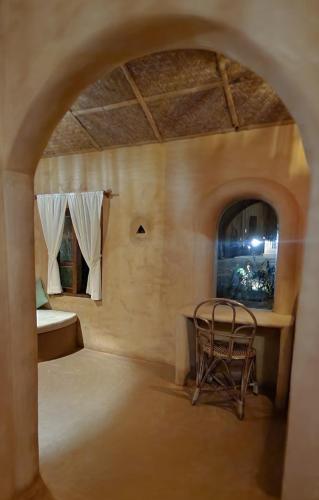 Nelli Mud Village in Tholpetty